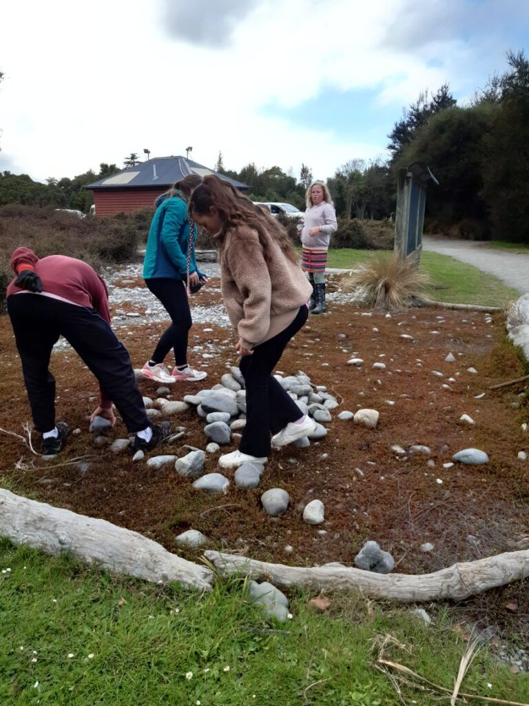 Replacing stones in butterfly garden